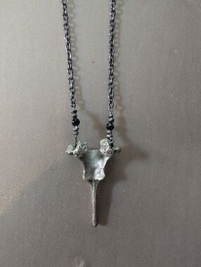 Handcrafted Black and Silver Vertebra Pendant Necklace